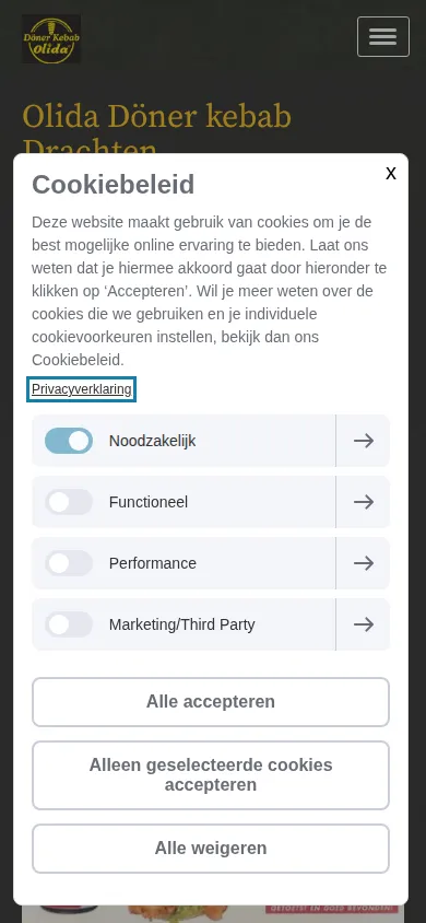 De huidige homepage van olidadrachten.nl op een telefoon